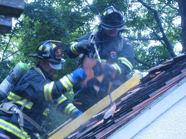 GARAGE FIRE BEDFORD CENTER RD
R to L Ex Chief D. Liburdi and FF Kane